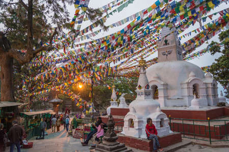 Kathmandu, Nepal - March 25, 2018: Evening at the Swayambhunath Temple Center on March 25, 2018 in...