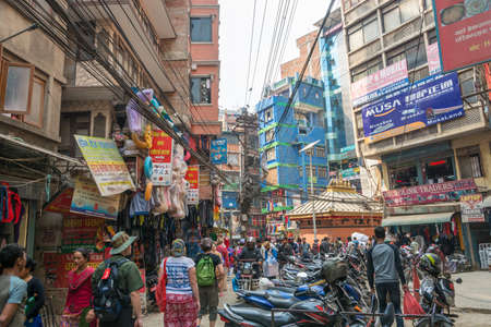 Kathmandu, Nepal - March 25, 2018: A sunny day on the narrow streets of Kathmandu March 25, 2018 in Kathmandu, Nepal.のeditorial素材