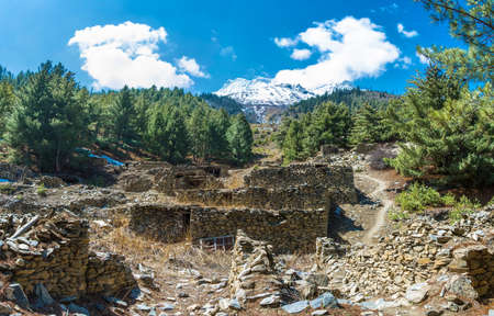Ruins of an ancient village in the Himalayas on a clear Sunny day, Nepal.の写真素材