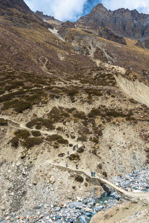 Brave tourists in the beautiful Himalayan mountains on a spring day, Nepal.の写真素材