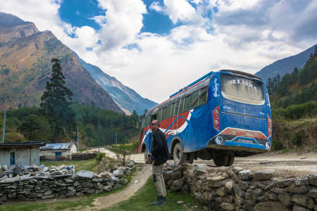 Track around Annapurna, Nepal-09.04.2018: Bus stop on mountain road 9 April 2018 track around Annapurna, Nepal.のeditorial素材
