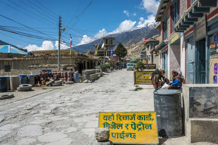 Jomson, Nepal-09/04/2018: Narrow village street in mountain village 9 April 2018 Jomson, Nepal.のeditorial素材