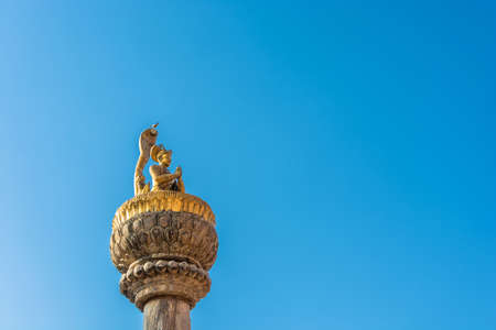 Original decoration on top of Buddhist temple on blue sky background, Nepal.のeditorial素材