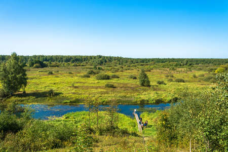 Luh, Ivanovo Region, Russia - 08/25/2018: On the Luha River in a clear, sunny day on August 25, 2018 in the city of Luh, Ivanovo Region, Russia.のeditorial素材