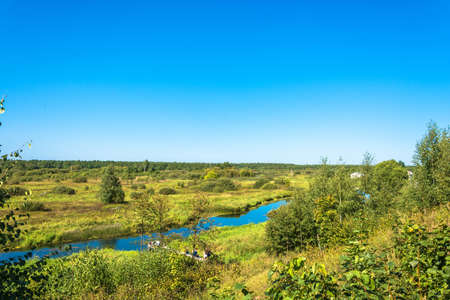 Luh, Ivanovo Region, Russia - 08/25/2018: On the Luha River in a clear, sunny day on August 25, 2018 in the city of Luh, Ivanovo Region, Russia.のeditorial素材