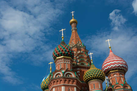 Multicolor towers of St. Basil's Cathedral against a cloudy sky, Moscow, Russia.の写真素材