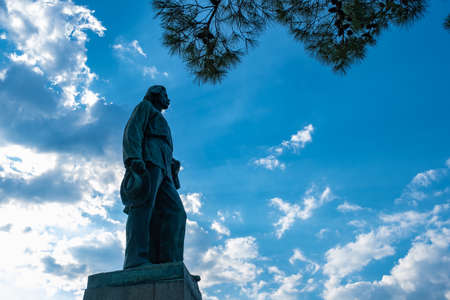 Monument to Soviet writer Maxim Gorky against a cloudy sky in Yalta, Crimea.の写真素材