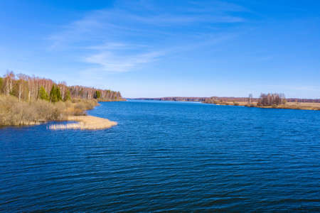 Wide Uvodsky reservoir with blue water of the reflected sky, Ivanovo region, Russia.の写真素材