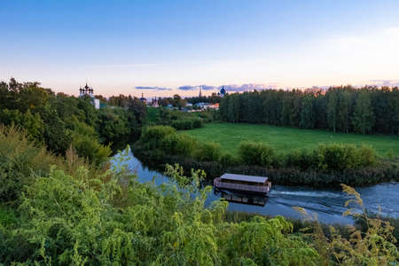 River tram on the Kamenka River in the ancient city of Suzdal, Russia.の写真素材