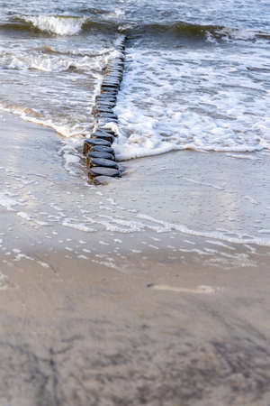 Waves on the beach of Zempin on the island of Usedom on a beautiful day in summerの写真素材