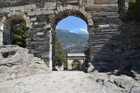 A Romanesque gate in the city of Susa in the province of Turinの写真素材