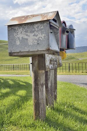 Letterboxes alongside road in countrysideの写真素材