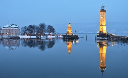 Twilight on Lindau harbor in winter, Bodensee, Germanyの写真素材
