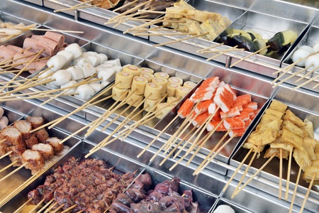 Raw food on skewers in asian market, Penang, Malaysia の写真素材