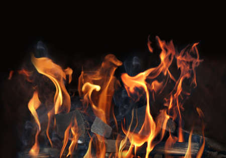 Flames coming from the logs on fire の写真素材