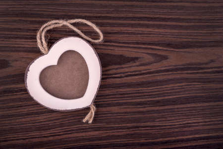 frame in wood heart shape on wedge woodの写真素材