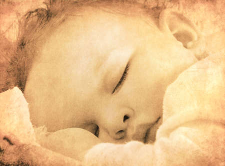 Closeup of sleeping baby lying on comfortable blanket  Retro style の写真素材