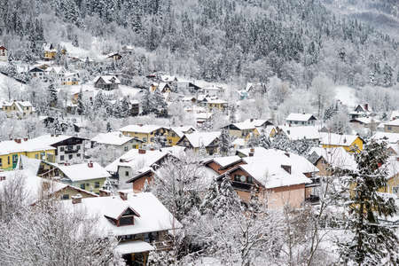 Winter white landscape poland village in the mountain area covered by snow.の写真素材