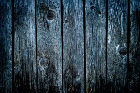 Old rich wood grain texture background with knots.の写真素材