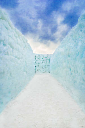 Snow corridor labyrinth with no way out.の写真素材