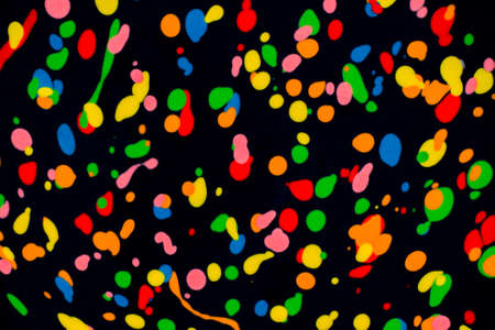 Colorful abstract acrylic painting. Natural dynamic mixture of oil colored pigments fluid spots on...