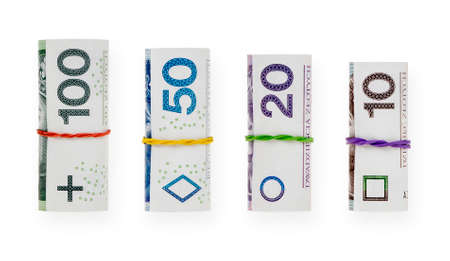 Rolled with a rubber polish zloty banknotes isolated on white background with clipping pathの写真素材