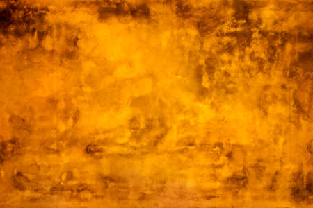 Grunge yellow painted wall texture background.の写真素材