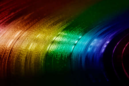 Colorful surface of an old vinyl record. Macro shot, shallow depth of field.の写真素材