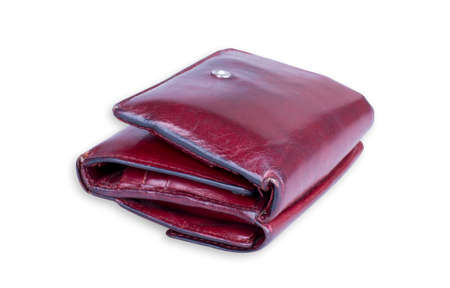 Worn out red leather wallet isolated on white background.