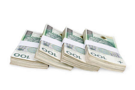 Bundles of polish 100 zloty banknotes. Isolated on white.