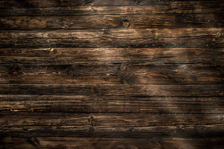 Old vintage rich real planked wood grain texture background with knots.