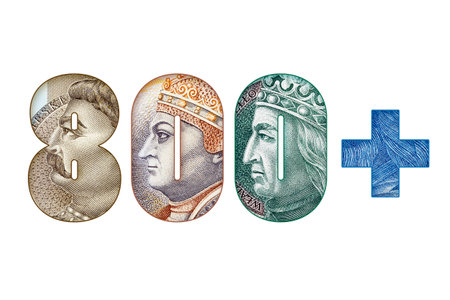 Inscription 800+ (systemic support for Polish families) made of Polish Banknotes. Concept of family government social program. Isolated on White Backgroundの写真素材