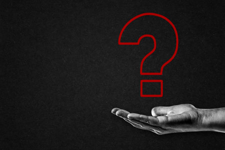 Hand in Black and White with Red Question Mark, Copy Spaceの写真素材