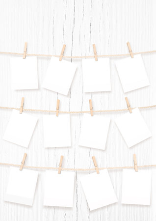 Twelve Blank Rectangle Frames for Baby Pictures Hanging on Rope Isolated on White and PNG Transparent Background. My First Yearの写真素材