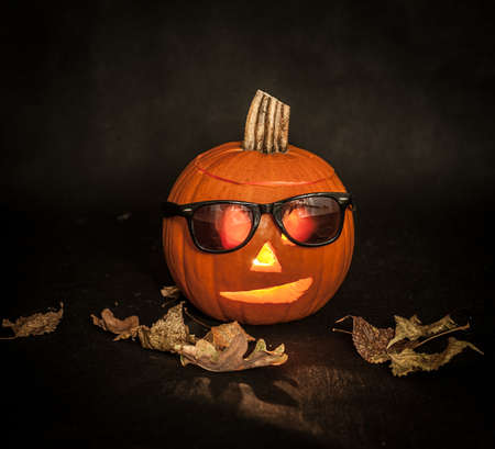Halloween fun cool pumpkin with sunglassesの写真素材