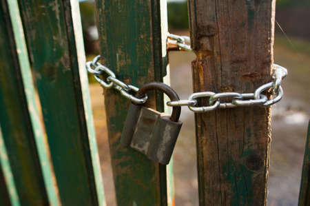 Security chain with padlock.Closed gate.の写真素材