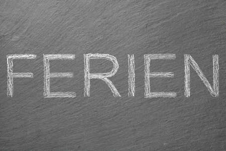 Blackboard with font holidaysの写真素材