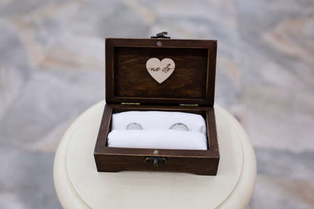 Gold wedding rings on the stand for rings