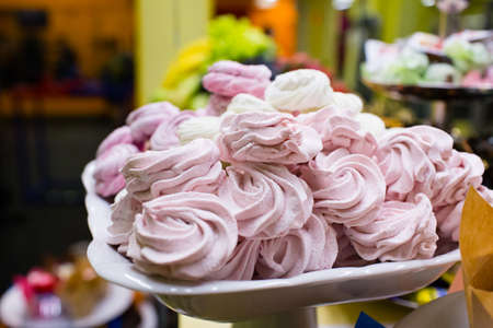 Pink sweet marshmallow on the plateの写真素材