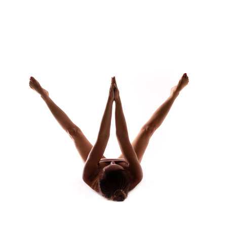 Yoga alphabet, letter W formed by yogi bodyの写真素材