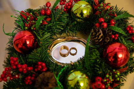 Gold rings for wedding ceremony on a stand