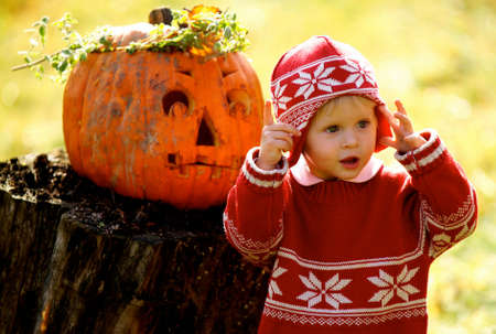 Girl and Halloween Pumpkinの写真素材