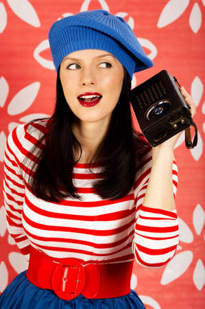 young smiling caucasian woman wearing retro clothesの写真素材