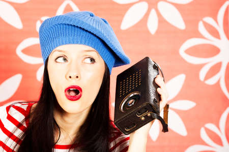 young smiling caucasian woman wearing retro clothesの写真素材