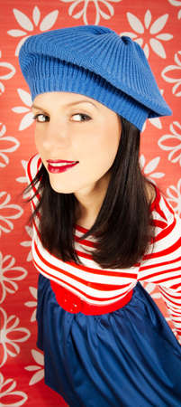 young smiling caucasian woman wearing retro clothesの写真素材