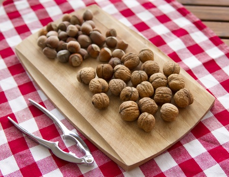 group of walnuts lying on kitchen table