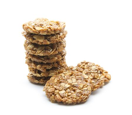 organic oat cookies isolated on white backgroundの写真素材