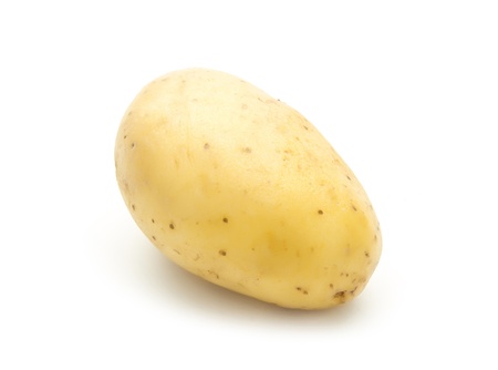 single organic potatoe isolated on white backgroundの写真素材