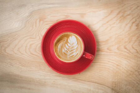 cup of coffee on wooden tableの写真素材