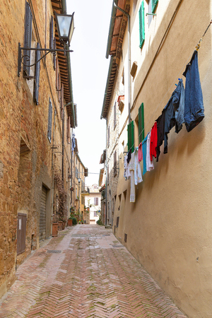 Narrow street on a spring day in small town Pienza, Tuscanyの写真素材